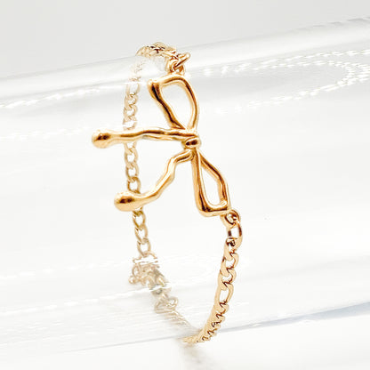 LINDO - Bracelet avec un boucle coquette