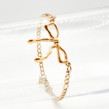 LINDO - Bracelet avec un boucle coquette