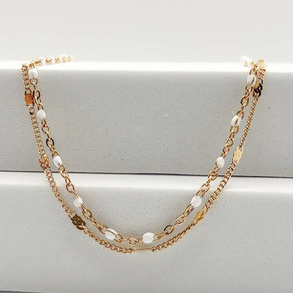 COSTA - Collier à DEUX CHAÎNES, blanc & or BYNOVANN