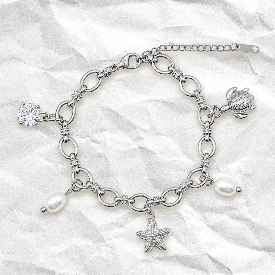 CORAL - Bracelet à BRELOQUES avec coquillages, éléments océan BYNOVANN