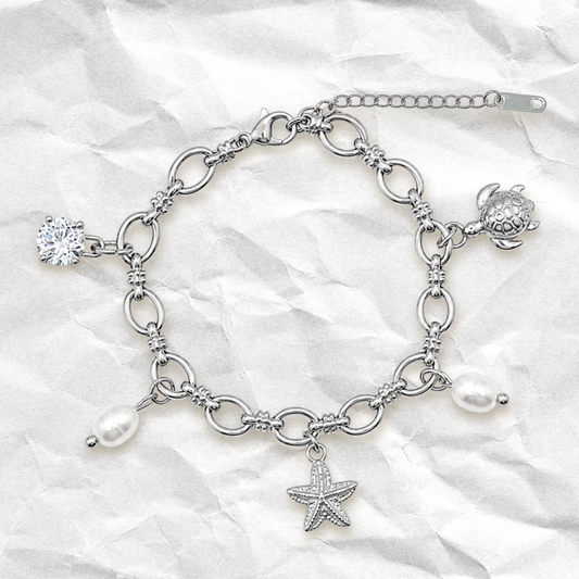 CORAL - Bracelet à BRELOQUES avec coquillages, éléments océan BYNOVANN