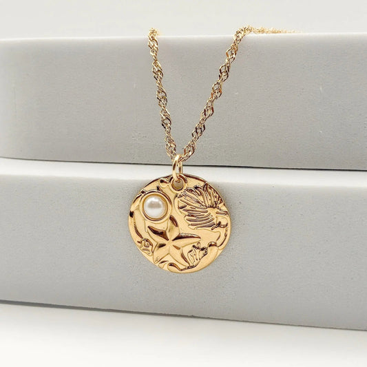 BAHIA - Collier avec pendentif aux signes de l’océan - BYNOVANN